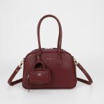 Bolso de mano con minibolso a juego