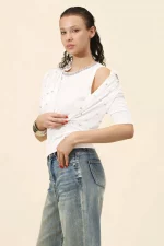 Top de punto sin manga con cuello joya