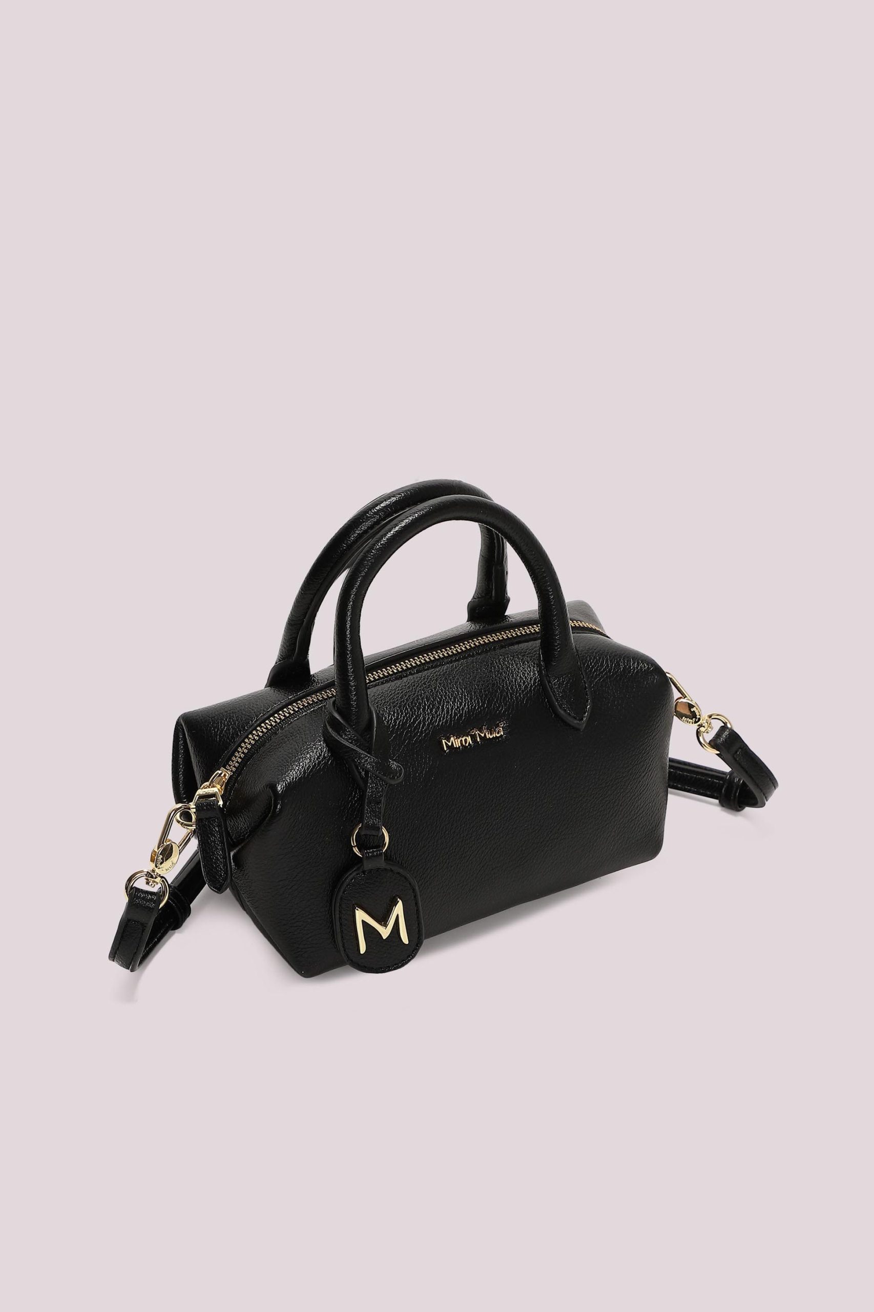 Bolso_pequeo_con_asa_superior_y_placa_con_logotipo_2.jpg